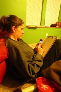 Rachel Lynch tries to balance time between homework and electronic usage. Photo by Molly Maschka
